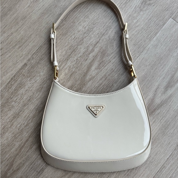 Prada Handbags - Prada Cleo Patent Leather Bag Cream